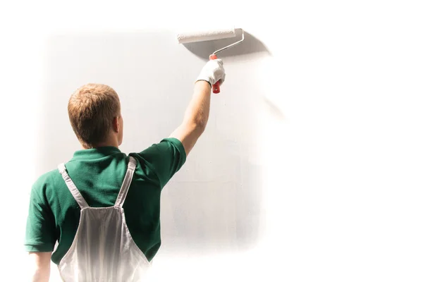 Decorador Masculino Pintando Una Pared Con Color Blanco —  Fotos de Stock