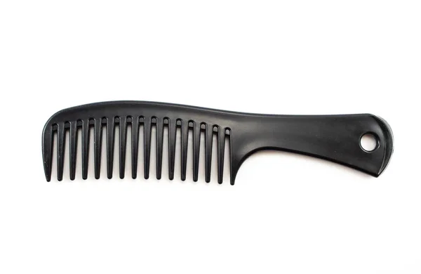 Beyaz arkaplanda siyah tarak izole edildi