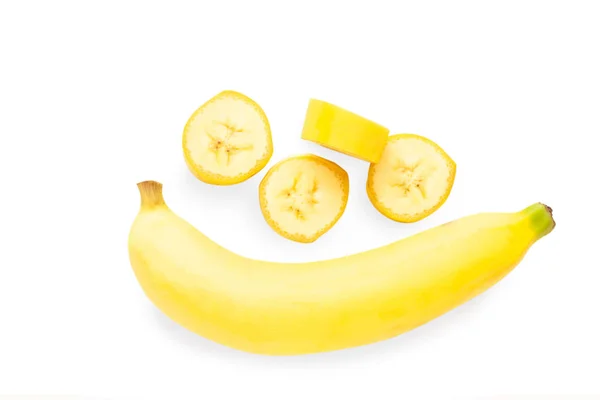 Üstten görünüm muz dilim beyaz arka plan üzerinde izole.