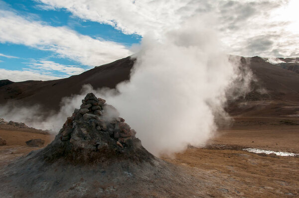 Fuming sulfur fumes in Hverir, in the Krafla volcanic system, in Iceland