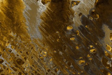 altın arka plan boya ile doku sıçramalarına