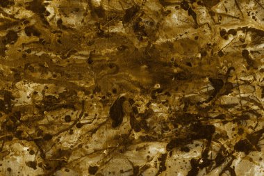 altın arka plan boya ile doku sıçramalarına