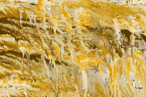 golden abstract background with paint splashes texture