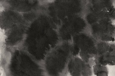 Kağıt arka plan üzerinde siyah mürekkep