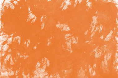 Kağıt arka plan üzerinde turuncu mürekkep