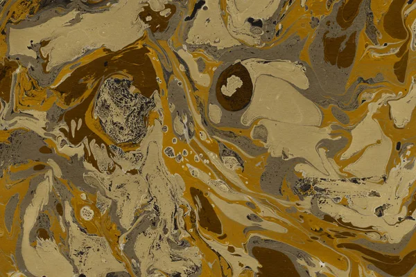 大理石の絵具の質感と黄金の抽象的な背景 — ストック写真