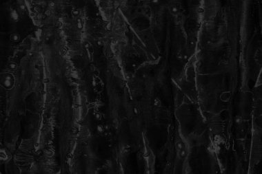 Siyah kağıt dokusu üzerinde gri akrilik boya ile. Kaotik soyut organik tasarım.