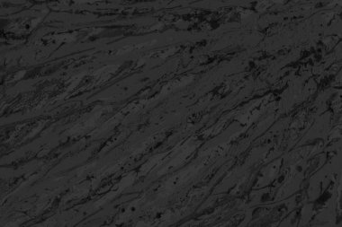 Siyah kağıt dokusu üzerinde gri akrilik boya ile. Kaotik soyut organik tasarım.