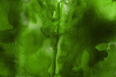 Kağıt arka plan üzerinde yeşil suluboya boya