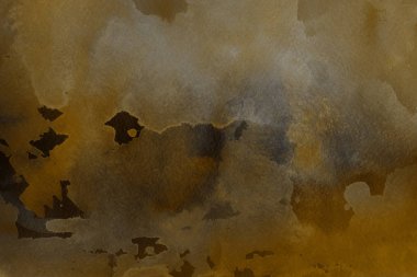 Kağıt arka plan üzerinde altın suluboya boya