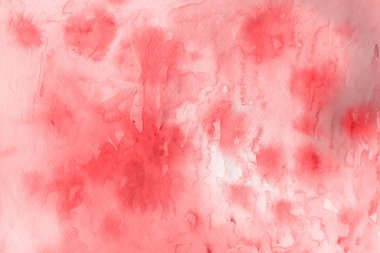 Kağıt arka plan üzerinde kırmızı sulu boya boya