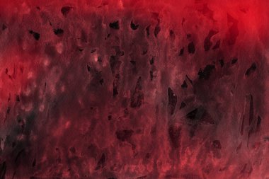 Kağıt arka plan üzerinde kırmızı sulu boya boya