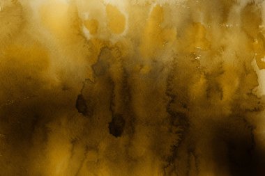 Kağıt arka plan üzerinde altın suluboya boya