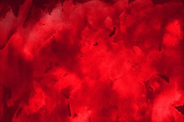 Kağıt arka plan üzerinde kırmızı sulu boya boya