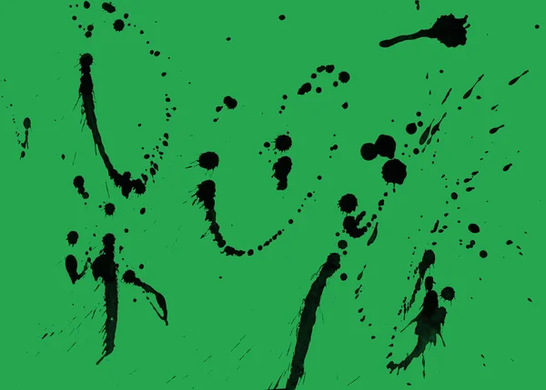 abstract black paint splatters texture on green background