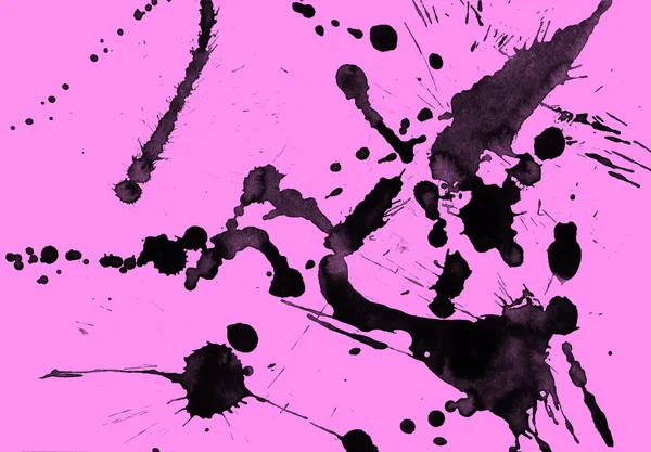 abstract black paint splatters texture on pink background