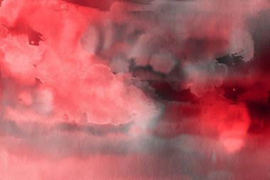 Kağıt arka plan üzerinde kırmızı sulu boya boya