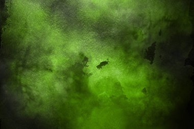 Kağıt arka plan üzerinde yeşil suluboya boya