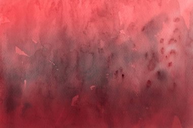Kağıt arka plan üzerinde kırmızı sulu boya boya