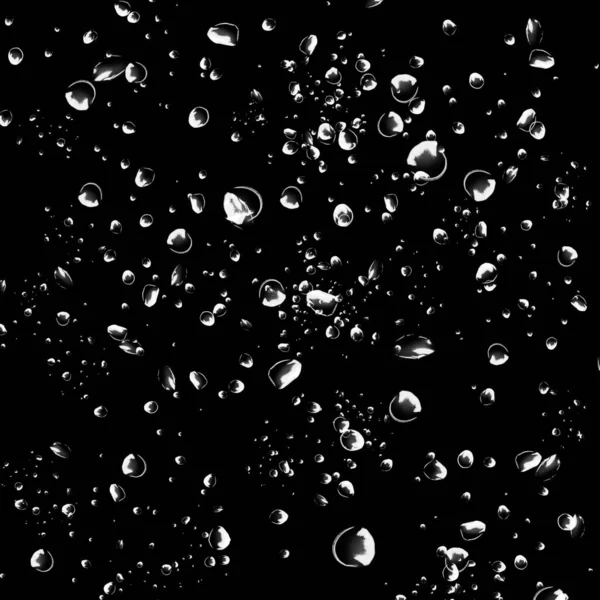 黒い背景に白い水の気泡を分離しました 水滴は雨します 水中の酸素 — ストック写真