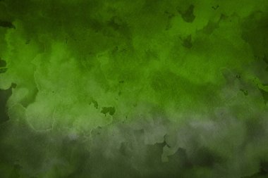 Kağıt arka plan üzerinde yeşil suluboya boya