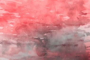 Kağıt arka plan üzerinde kırmızı sulu boya boya