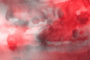 Kağıt arka plan üzerinde kırmızı sulu boya boya