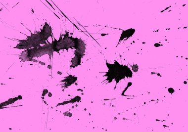 Soyut siyah boya doku pembe bir arka plan üzerinde splatters