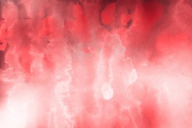 Kağıt arka plan üzerinde kırmızı sulu boya boya