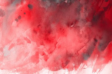 Kağıt arka plan üzerinde kırmızı sulu boya boya