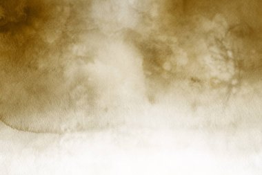 Kağıt arka plan üzerinde altın suluboya boya