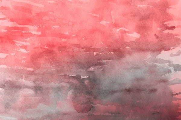 Kağıt arka plan üzerinde kırmızı sulu boya boya