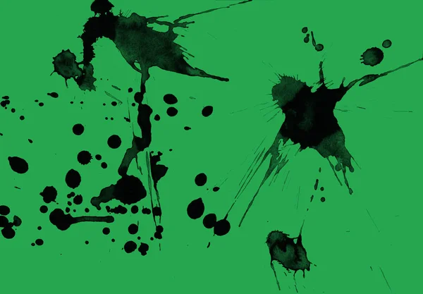 abstract black paint splatters texture on green background