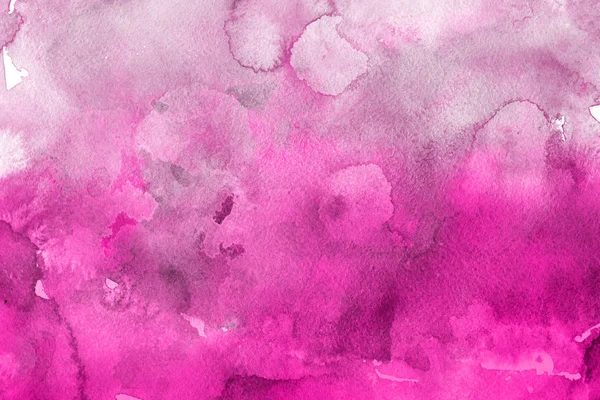 pink watercolor paint on paper abstract background