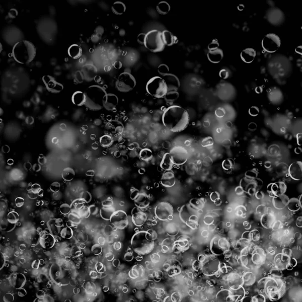 abstract wallpaper with soap bubbles on dark background