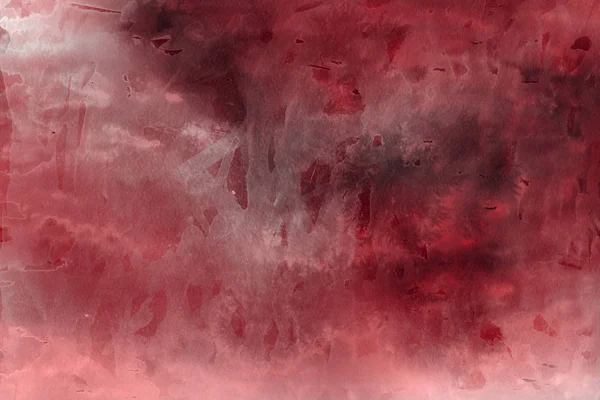 Kağıt arka plan üzerinde kırmızı sulu boya boya