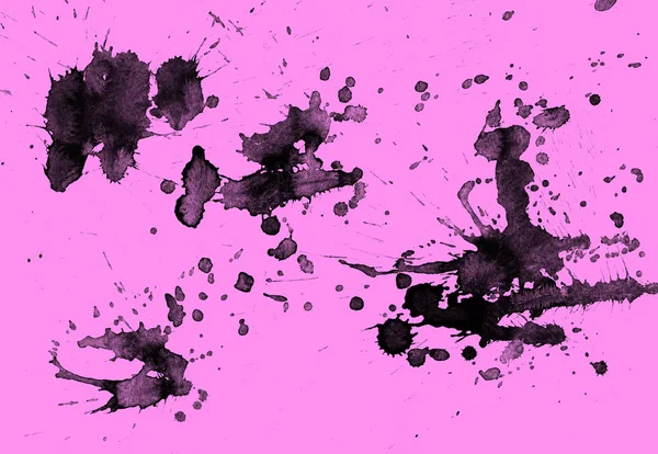 abstract black paint splatters texture on pink background