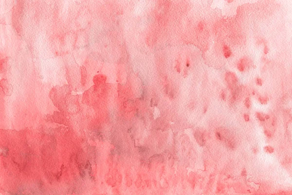 Kağıt arka plan üzerinde kırmızı sulu boya boya