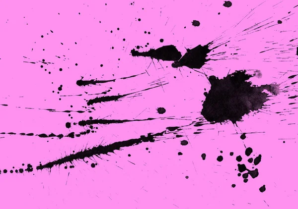 abstract black paint splatters texture on pink background