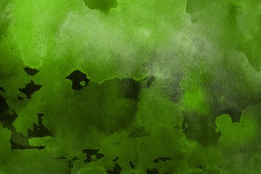 Kağıt arka plan üzerinde yeşil suluboya boya