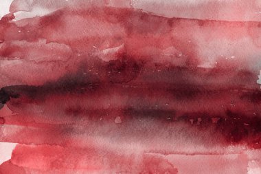Kağıt arka plan üzerinde kırmızı sulu boya boya