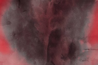 Kağıt arka plan üzerinde kırmızı sulu boya boya