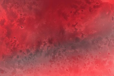 Kağıt arka plan üzerinde kırmızı sulu boya boya