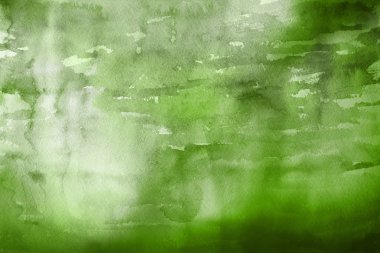 Kağıt arka plan üzerinde yeşil suluboya boya