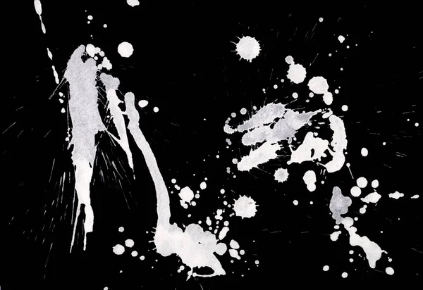 abstract white paint splatters texture on black background