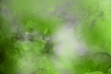 Kağıt arka plan üzerinde yeşil suluboya boya