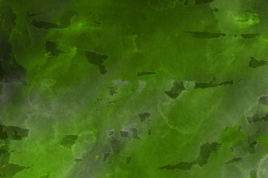 Kağıt arka plan üzerinde yeşil suluboya boya