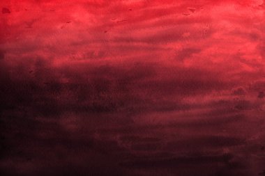 Kağıt arka plan üzerinde kırmızı sulu boya boya