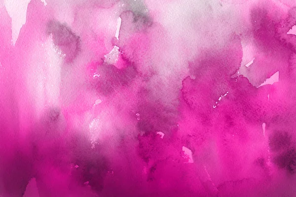 pink watercolor paint on paper abstract background