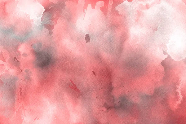 red watercolor paint on paper abstract background